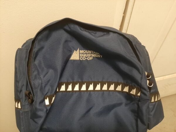 Mountain Equipment Co-op baby carrier for hiking with Rain cover and backpack